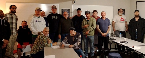 A group of men in recovery, working and growing strong.